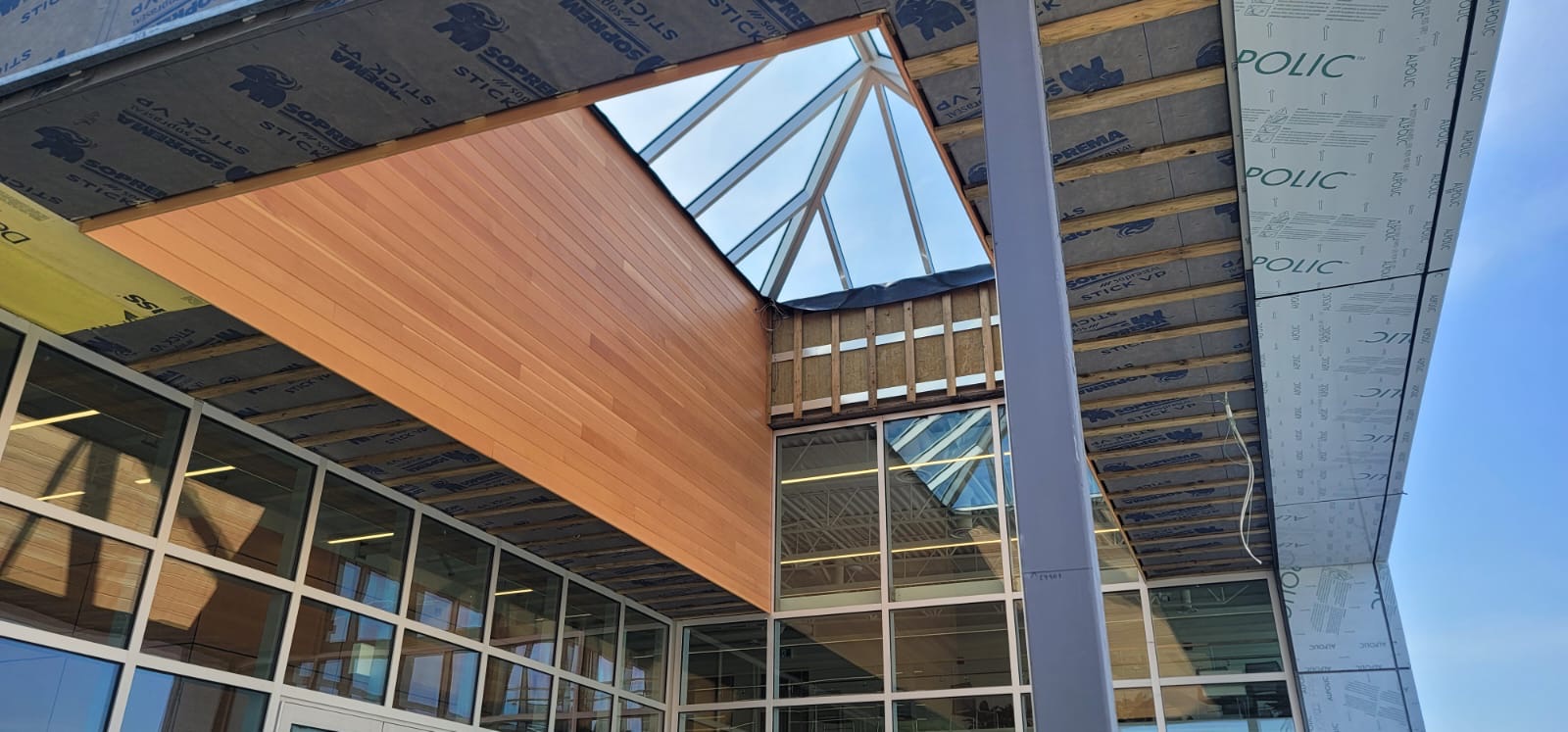Fir-lined skylight return at Abbotsford International Airport