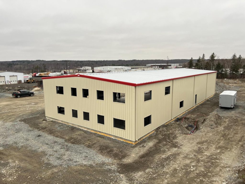 Aerial view of a two-storey pre-engineered industrial building