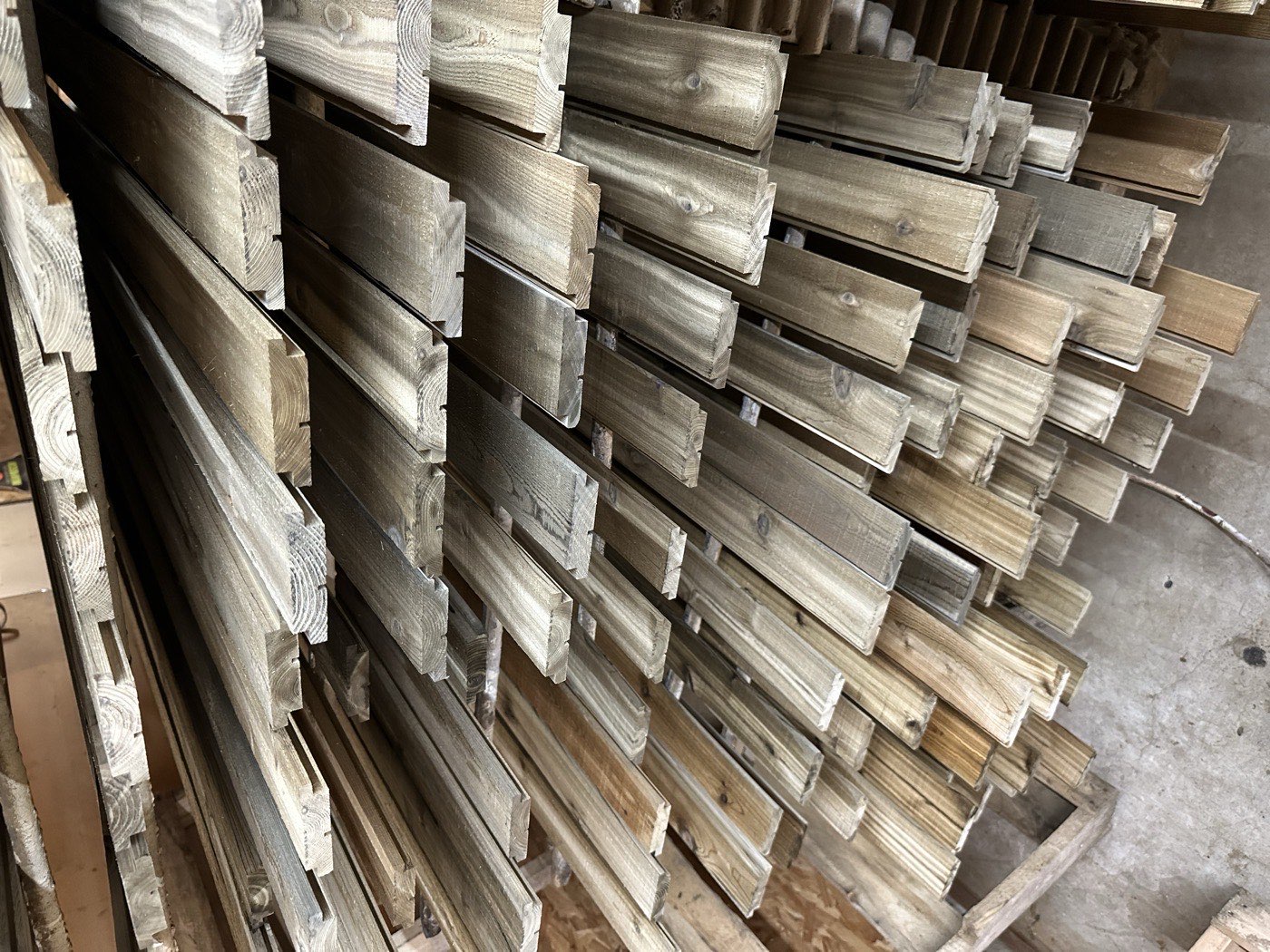 Stack of grey pattern stock lumber
